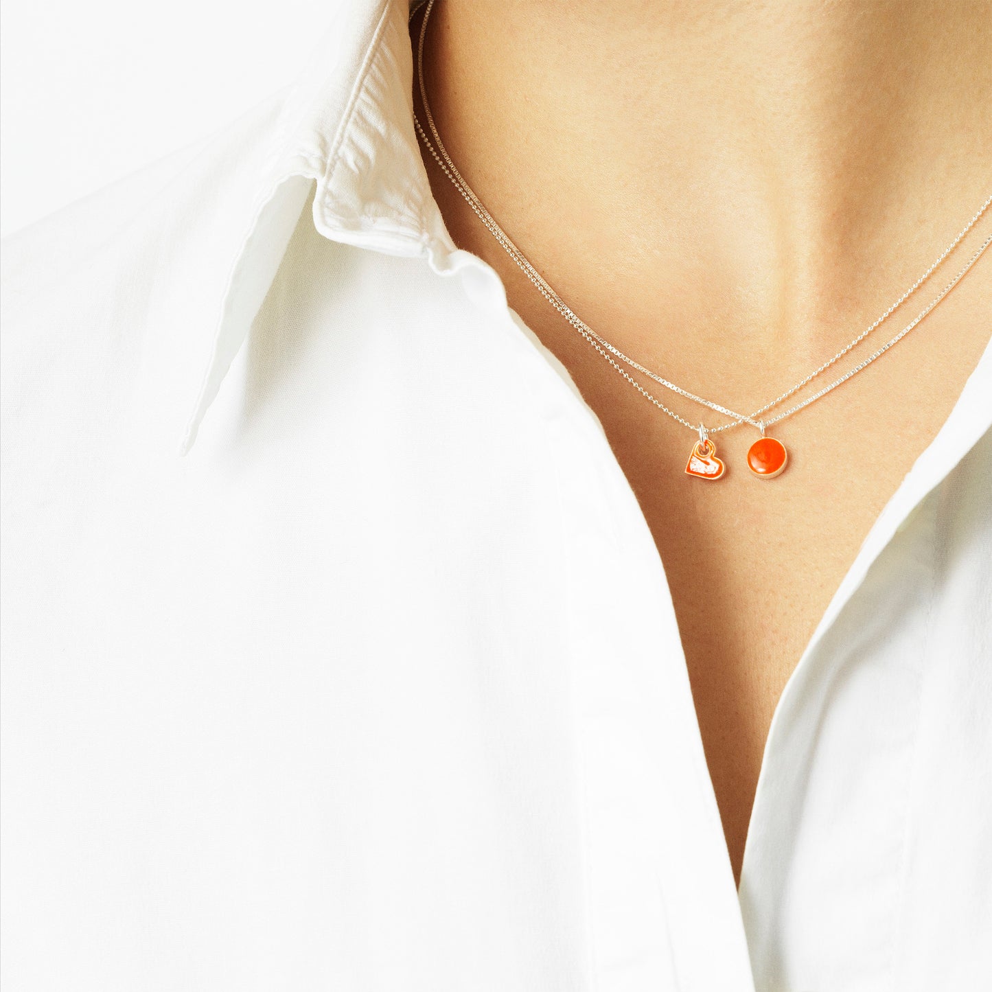 Schilderkette mit Anhänger. Neonorange. Sterlingsilber. Scherning Copenhagen