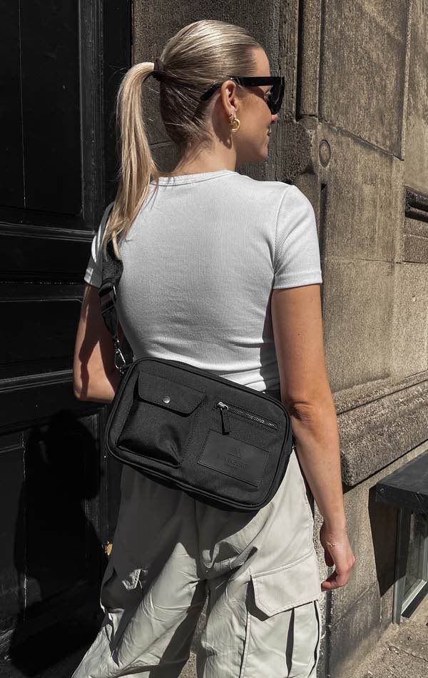 Sac bandoulière DarlaMBG. Taille M. Noir. 100 % polyester recyclé. Markberg
