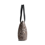 Sac cabas PerryMBG à imprimé léopard. Noir et beige. Polyester recyclé. Markberg.